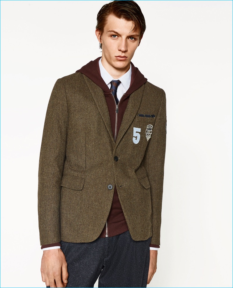 Channeling ivy league style, Finnlay Davis wears a patch wool blazer from Zara Man's College League collection.