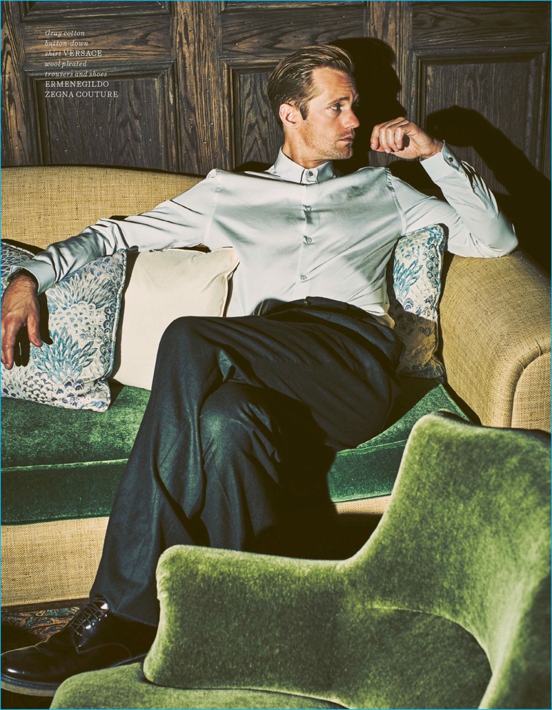 Allan Kennedy outfits Alexander Skarsgård in a Versace shirt with trousers and shoes by Ermenegildo Zegna Couture.