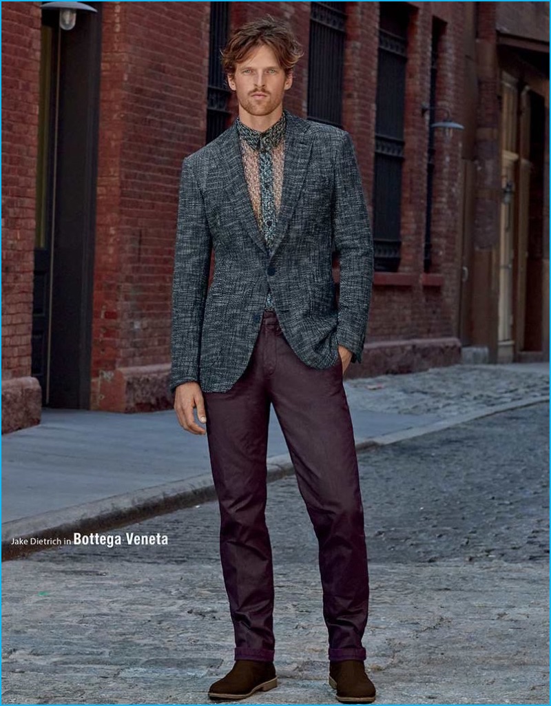 Jake Dietrich heads outdoors in a graphic blazer and sheer shirt from Bottega Veneta.
