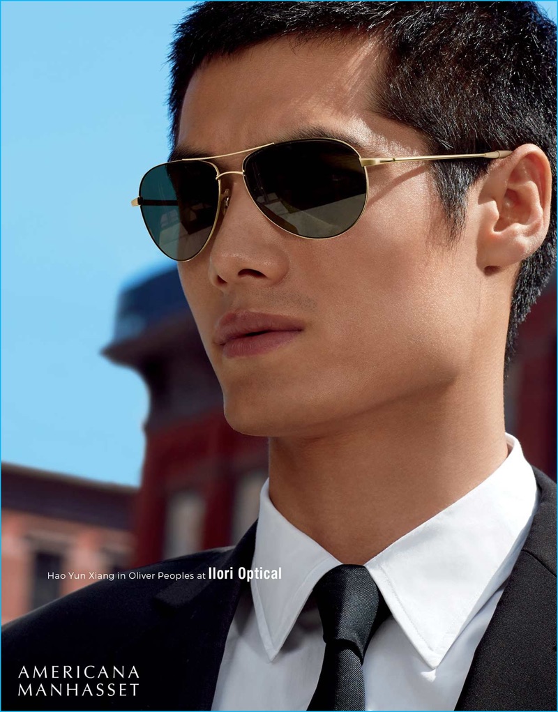 Model Hao Yun Xiang rocks aviator sunglasses from Oliver Peoples.