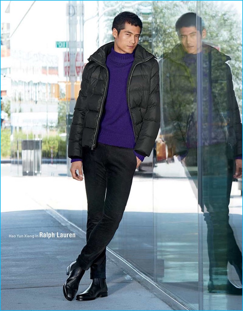 Hao Yun Xiang sports a puffer jacket, turtleneck sweater, trousers, and boots from Ralph Lauren.