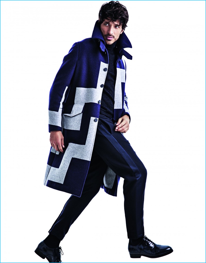 Top model Andres Velencoso dons a graphic coat from Louis Vuitton with fashions from Pal Zileri and Mango dress shoes.