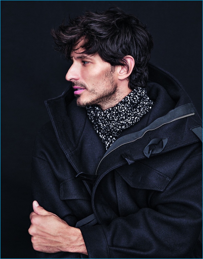 Delivering a profile, Andres Velencoso wears a Dsquared2 coat with a Cruciani sweater for Código Único.