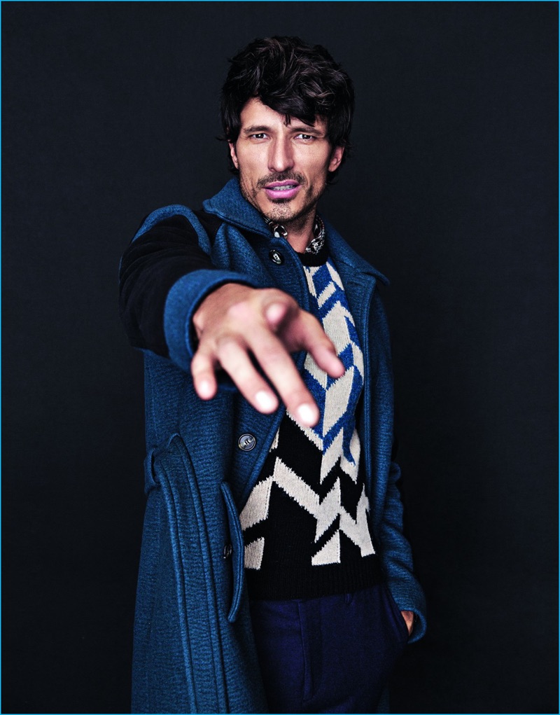 Veronica Suarez outfits Andres Velencoso in a coat and sweater from Salvatore Ferragamo with Just One trousers.