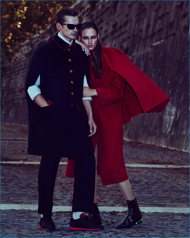 Models Anthon Wellsjo and Smith Vanders couple up for How to Spend It. Anthon wears a Burberry cape, trousers and sneakers with a Andreas Kronthaler for Vivienne Westwood shirt and Linda Farrow x Ann Demeulemeester sunglasses.