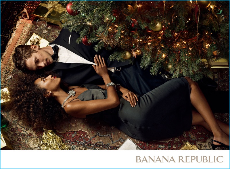 Mathias Lauridsen and Anais Mali get cozy underneath the Christmas tree for Banana Republic's holiday 2016 campaign.
