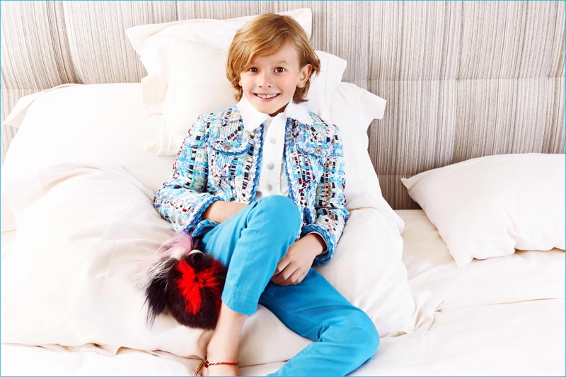 Hudson Kroenig dons a charming look from Chanel with a Karlito fur charm by Fendi.