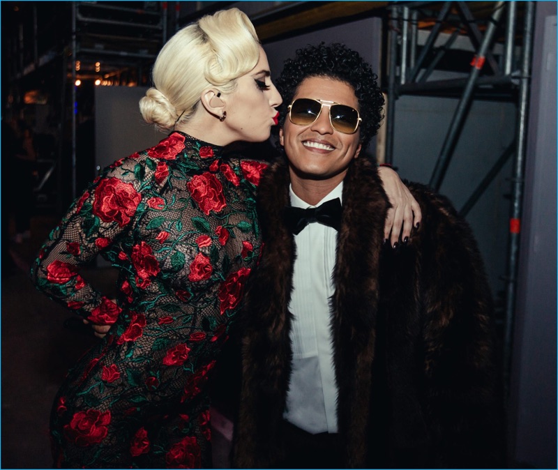 Lady Gaga and Bruno Mars pose for pictures at the 2016 Victoria's Secret fashion show.
