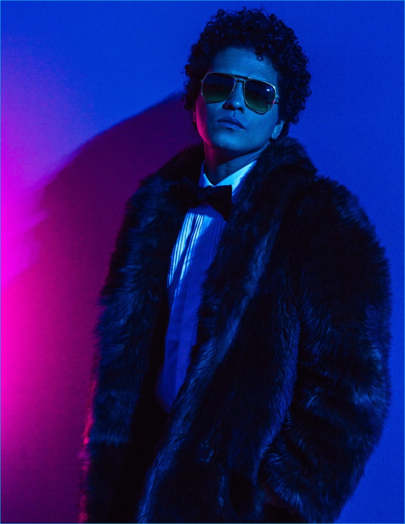 Singer Bruno Mars turns up the attitude in a fur coat while at the 2016 Victoria's Secret fashion show.