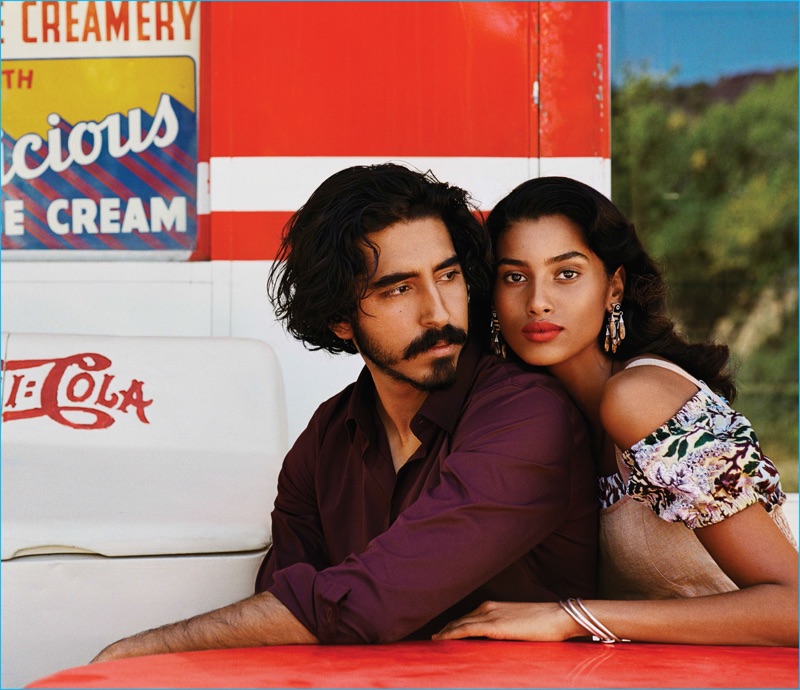 Alasdair McLellan photographs Dev Patel and Imaan Hammam for Vogue. Patel sports a purple shirt by Burberry.