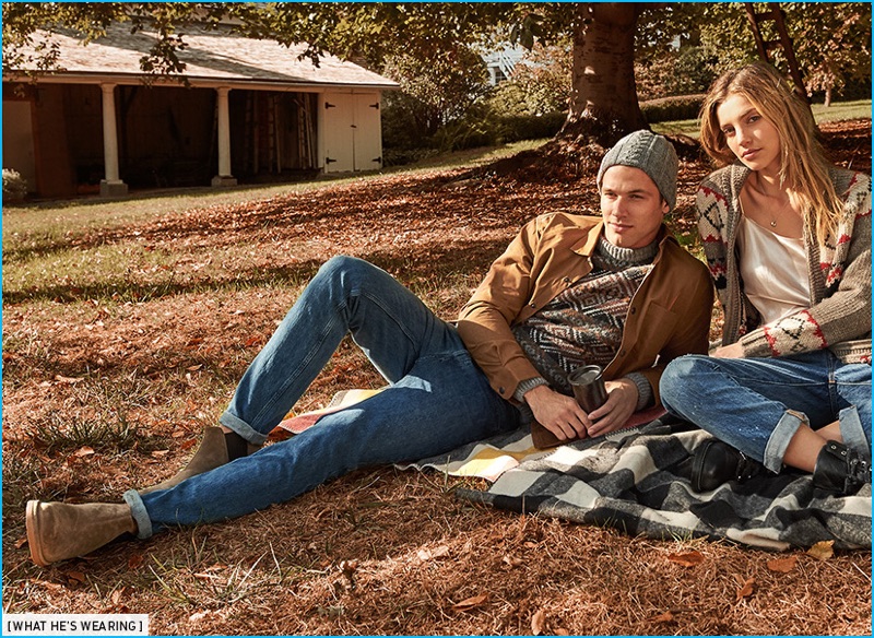 Kacey Carrig wears A.P.C. low standard jeans, Vince suede Chelsea boots, and Schnayderman's waxed cotton overshirt with a knit beanie and sweater from Howlin'.