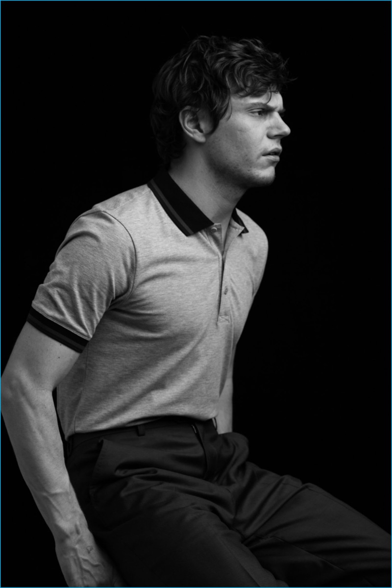 Evan Peters dons a Hugo Boss polo shirt with Ted Baker trousers for The Laterals.