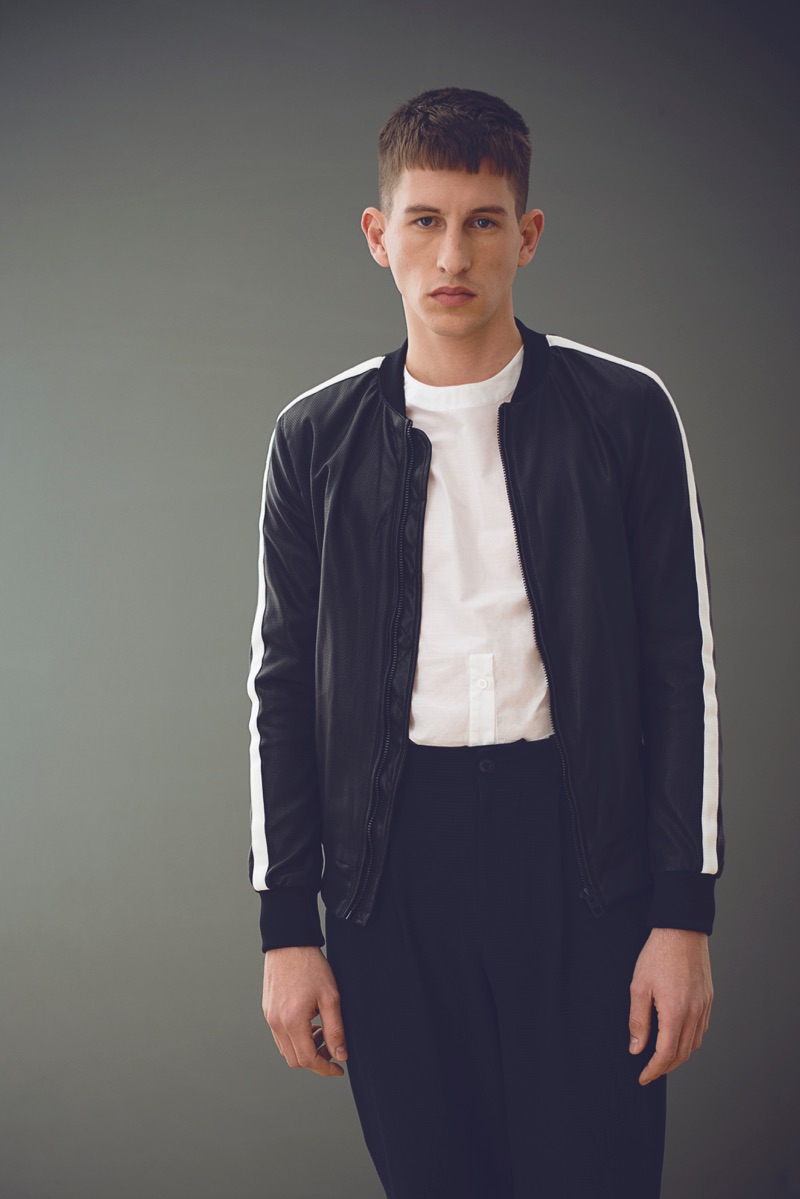 Jörg Strehlau photographs Jannik in a Zara Man bomber jacket with a Michael Sonntag shirt and Goetze pants.