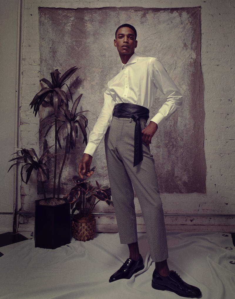 Darron wears shirt J.Hilburn, cropped trousers Tim Coppens, belt Neiman Marcus, and shoes Florsheim.