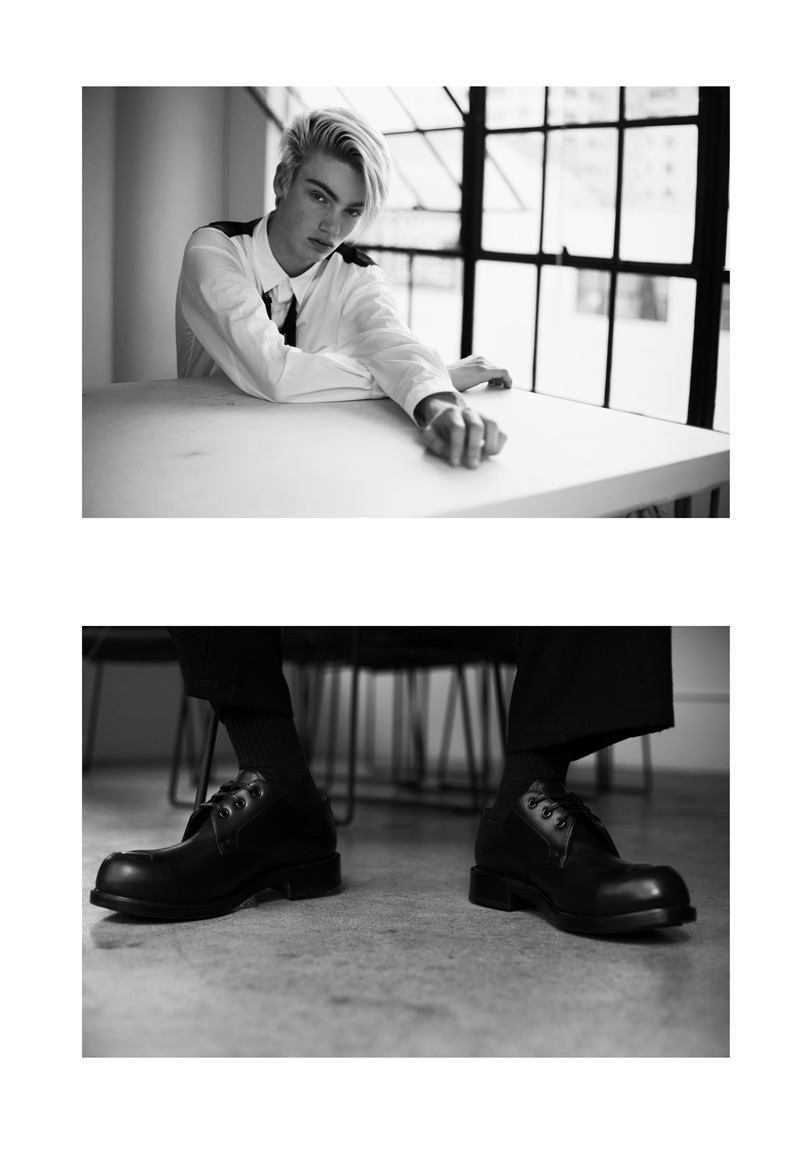 Fresh face Elijah wears a Comme des Garçons shirt, Societe Anonyme trousers, and Alexander McQueen dress shoes.