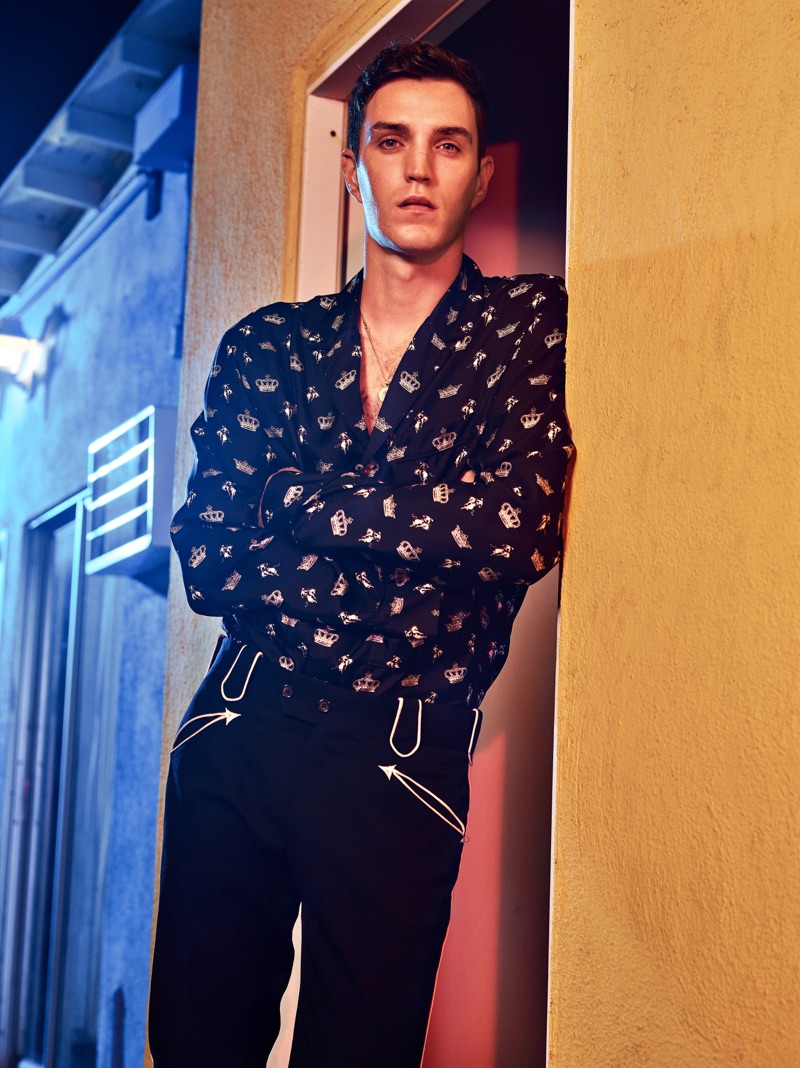 Josh Beech taps into Dolce & Gabbana's western themed fall with a patterned shirt and detailed pants.