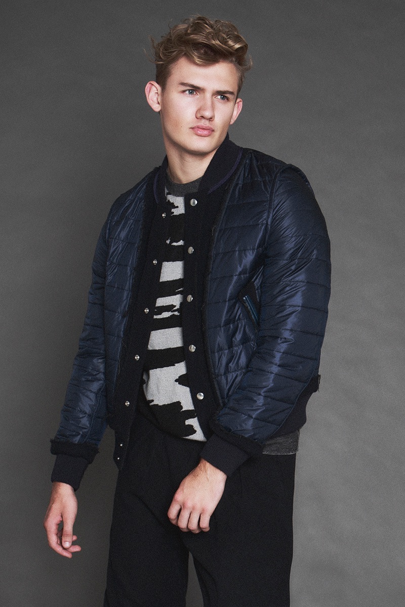 Tyler wears quilted jacket Sacai, sweater Theory, and trousers Christoph Lemaire.