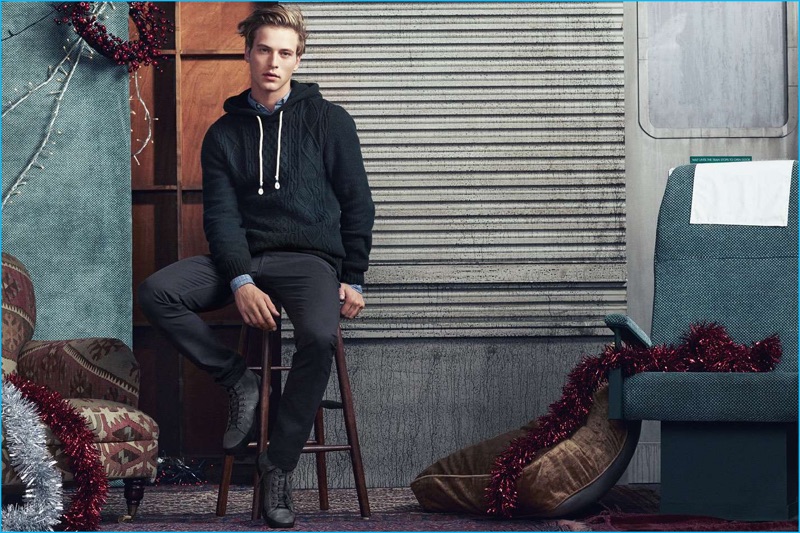 Jules Raynal goes casual in a hooded cable-knit sweatshirt and pants from H&M L.O.G.G.