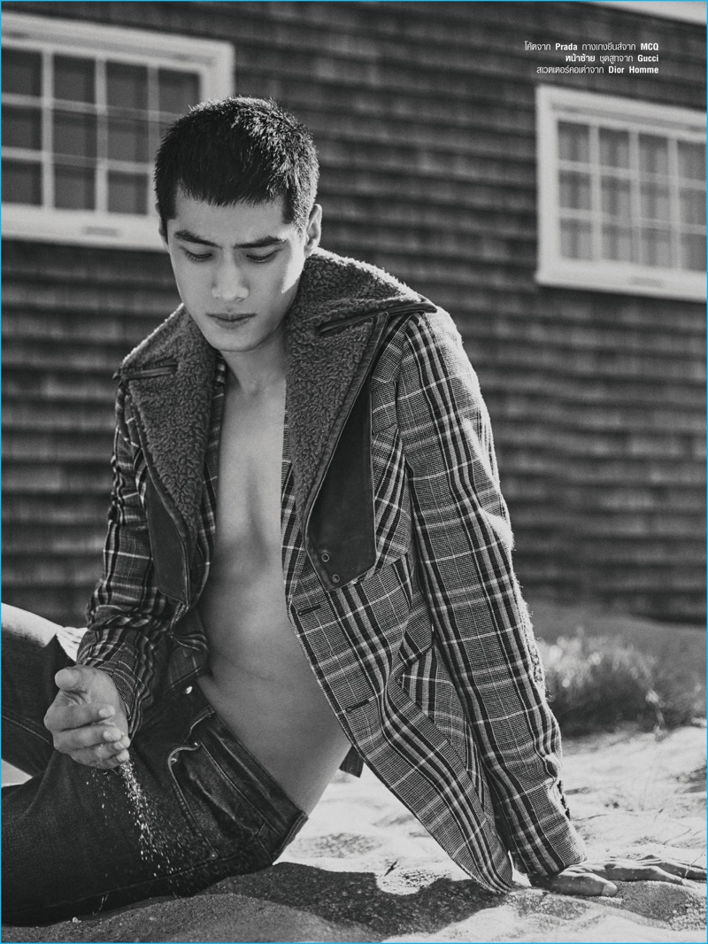 Mikey Asanin photographs Hao Yun Xiang in a check coat from Prada for Harper's Bazaar Men Thailand.