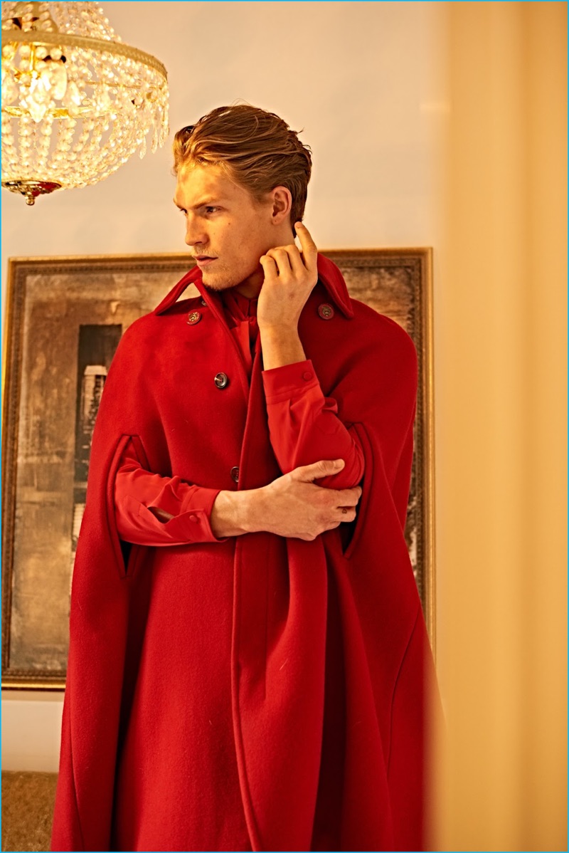 English model Harry Goodwins sports a red cape by Gucci for Seventh Man.