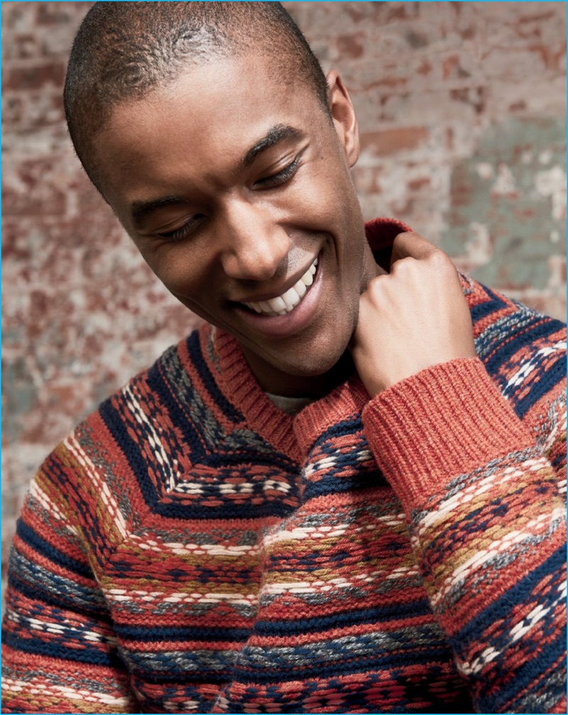 Claudio Monteiro is all smiles in a colorful fair isle sweater from J.Crew.