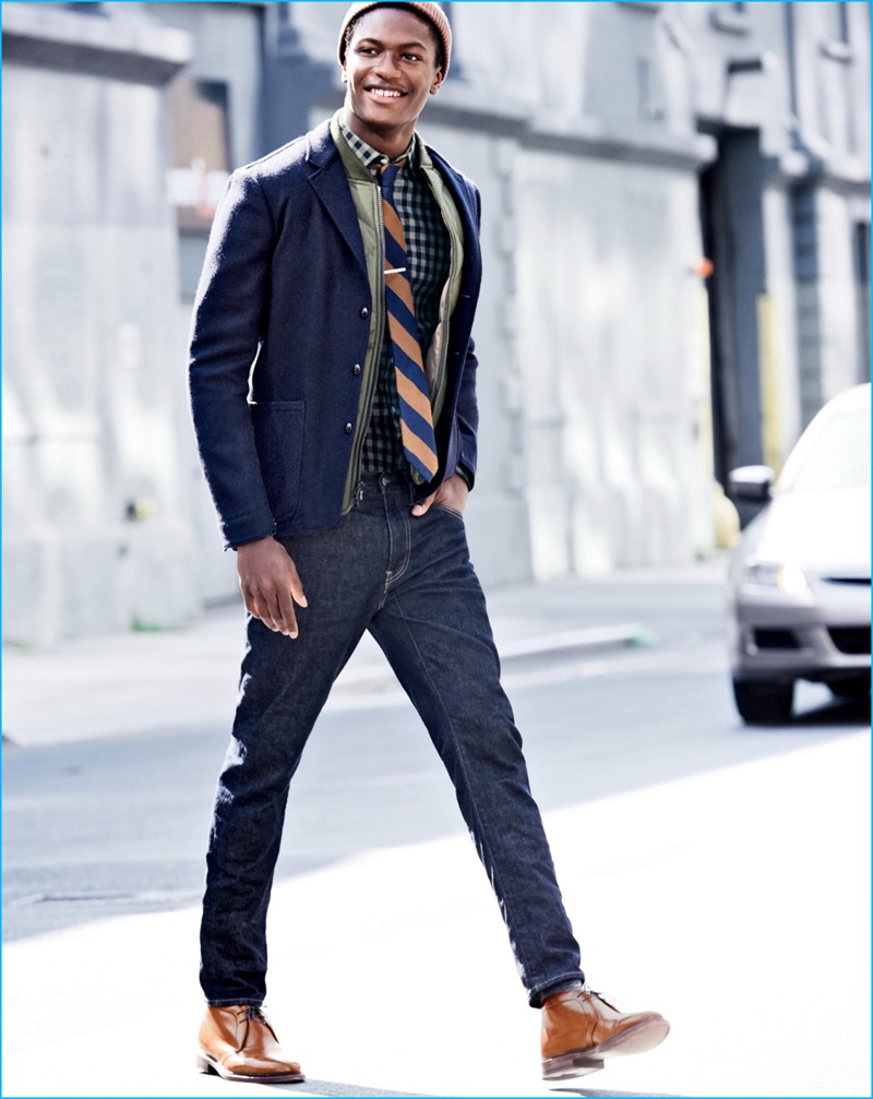 Hamid Onifade layers for the cold in a smart blazer, quilted jacket, and plaid button-down shirt from J.Crew.