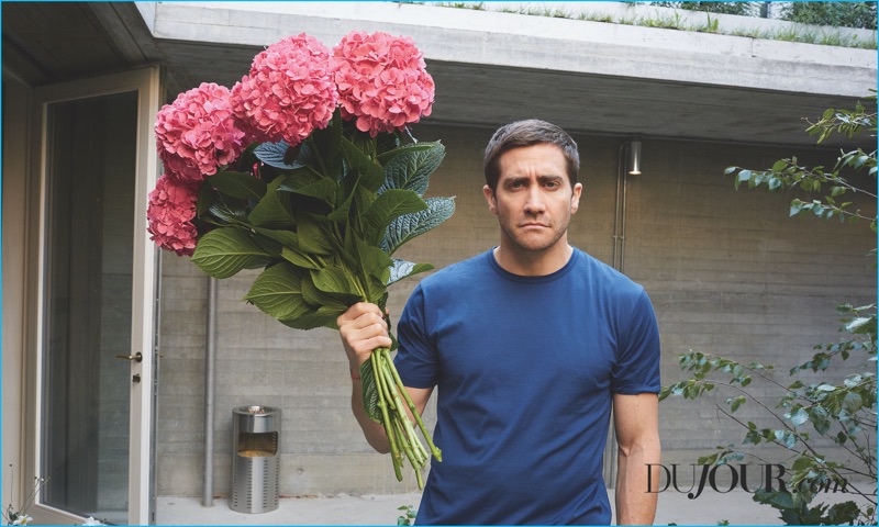 Holding a bouquet of flowers, Jake Gyllenhaal sports a Sunspel t-shirt with Hermes trousers.
