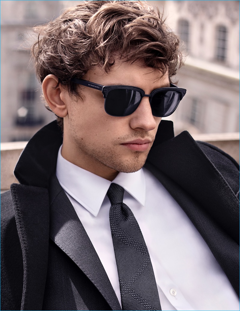 Actor Josh Whitehouse dons textured square frame sunglasses for Mr. Burberry's advertising campaign.