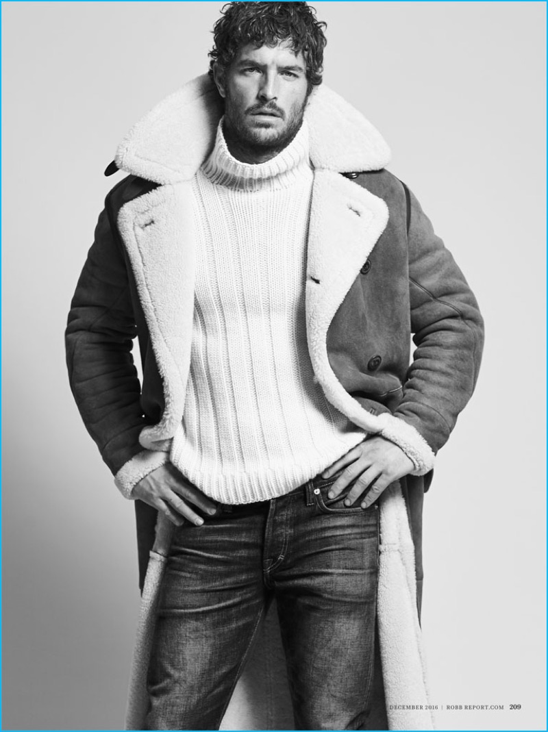 Justice Joslin wears a Jeffrey Rüdes shearling coat with a Luciano Barbera turtleneck sweater, Jonathan Mezibov shirt, and Frame Denim distressed jeans.