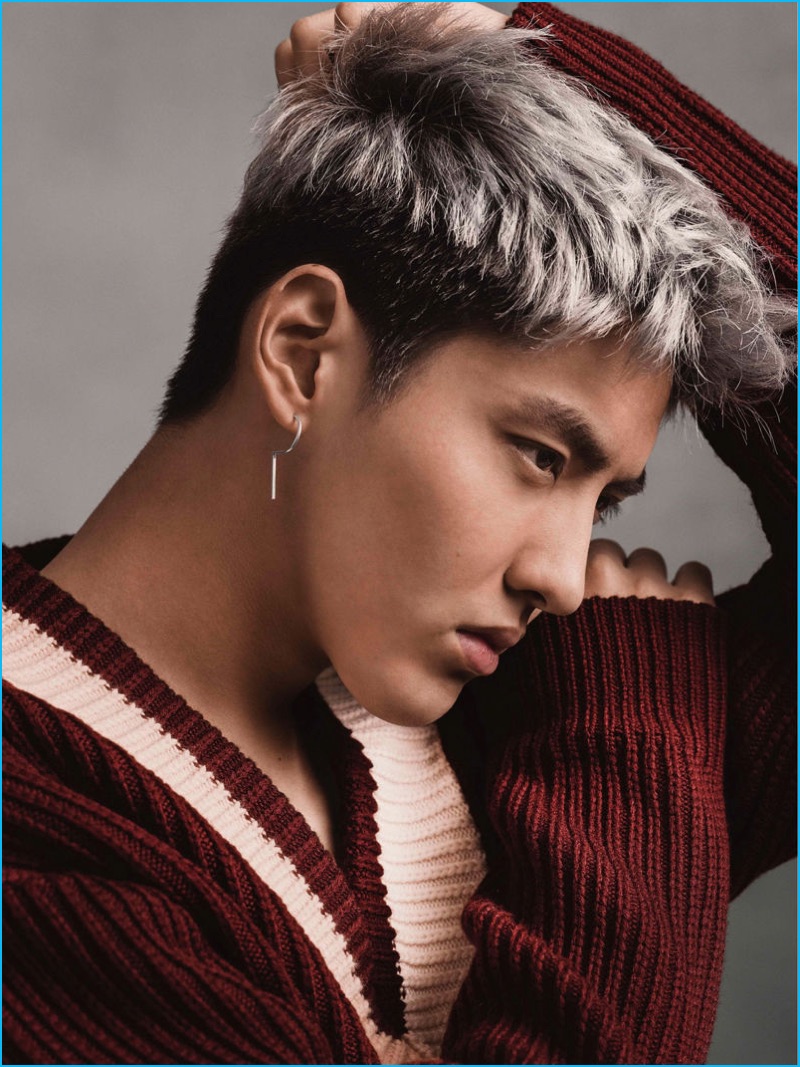 Showing a relaxed side, Kris Wu rocks a Burberry sports-striped wool sweater.