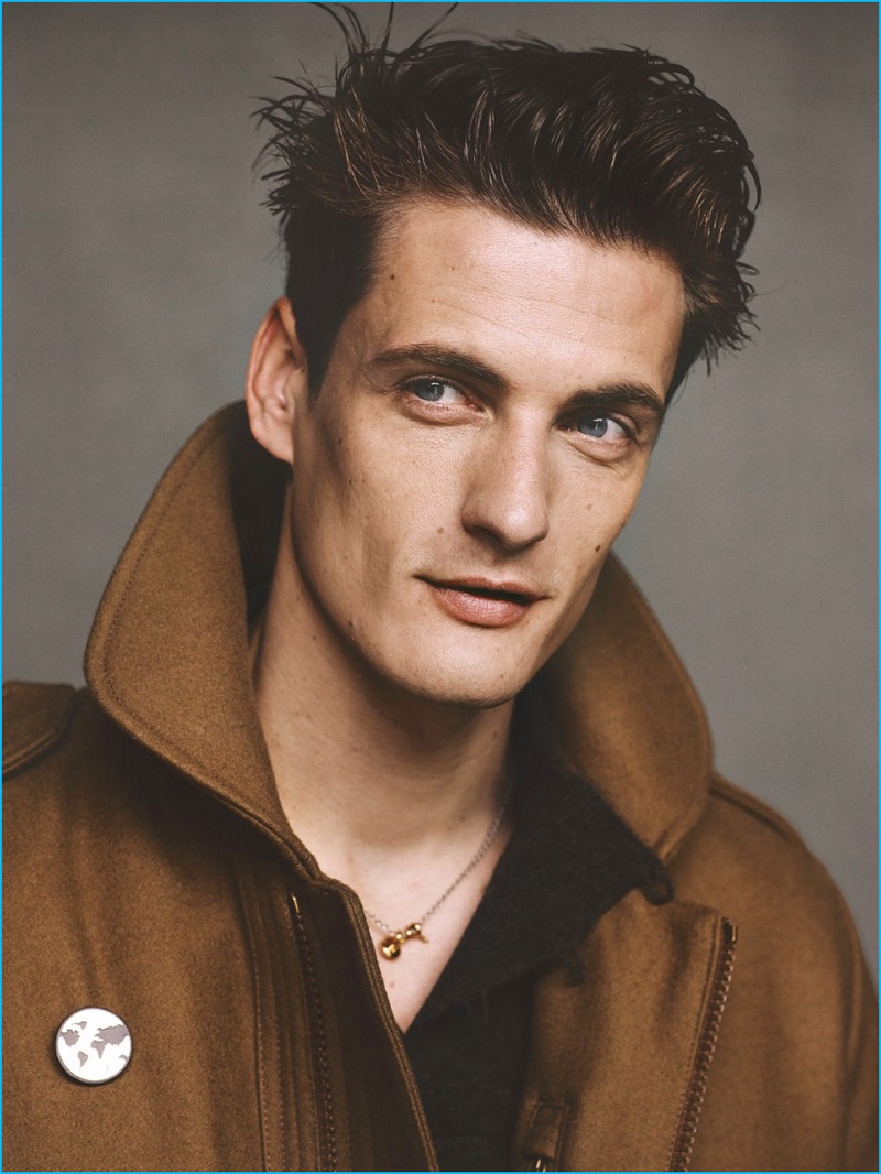 Ben Weller photographs Leo Eller in a Moncler wool coat with a Maison Margiela shirt, and Louis Vuitton accessories.