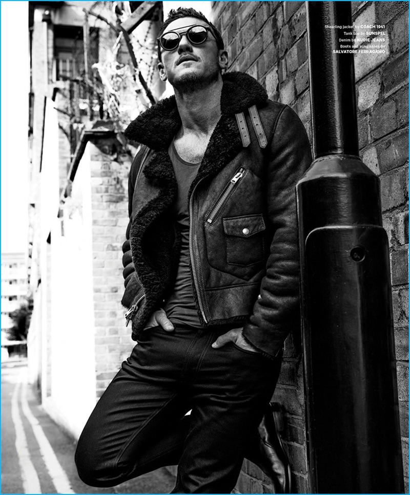 Zeb Daemen photographs Luke Evans in a shearling jacket from Coach 1941. Evans also sports a Sunspel tank, Nudie Jeans denim, as well as sunglasses and boots from Salvatore Ferragamo.