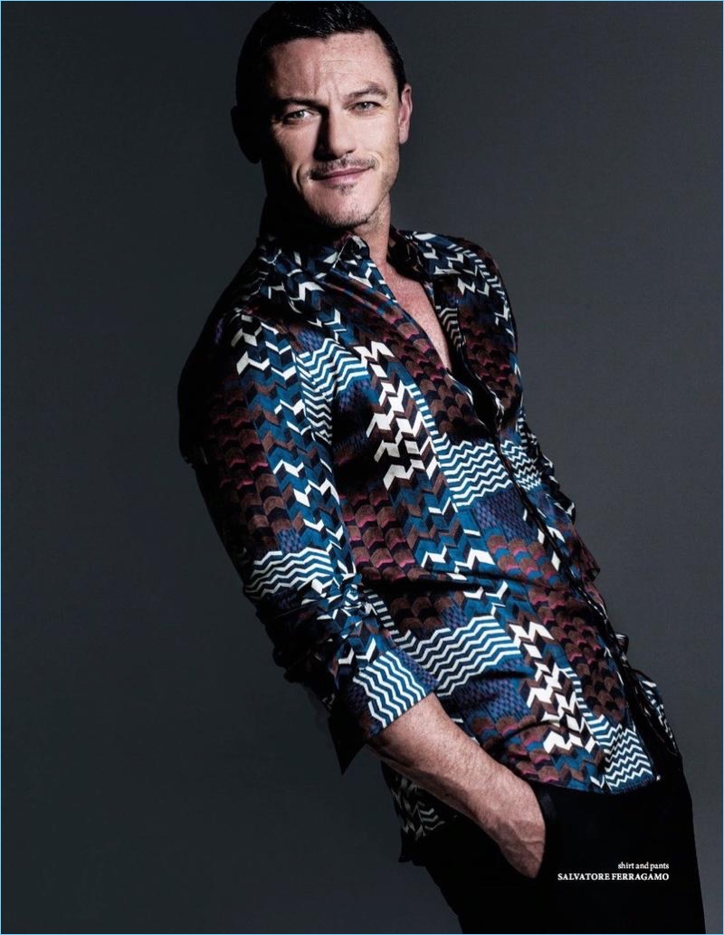 All smiles, Luke Evans wears Salvatore Ferragamo for The Fashionable Lampoon.