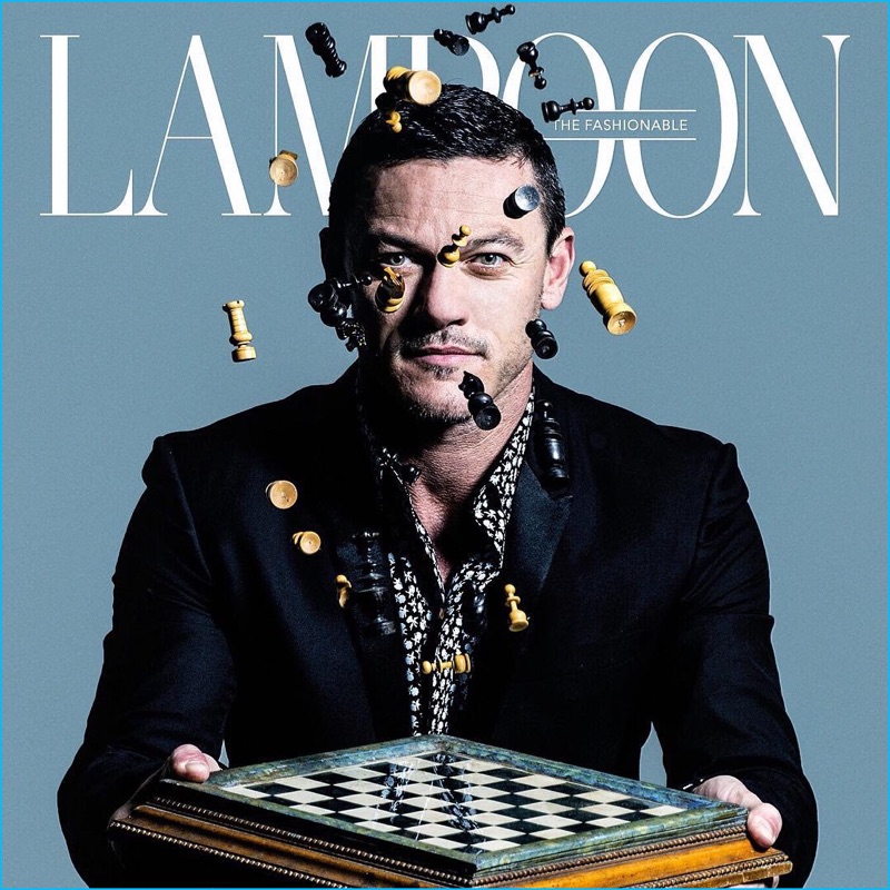 Actor Luke Evans poses with a chess board for the cover of The Fashionable Lampoon.