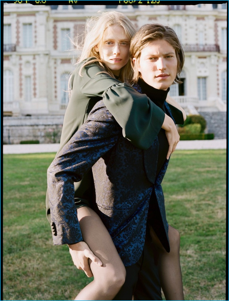 Model Boyd Gates is dashing in a midnight blue evening jacket for Mango Man's December 2016 campaign.