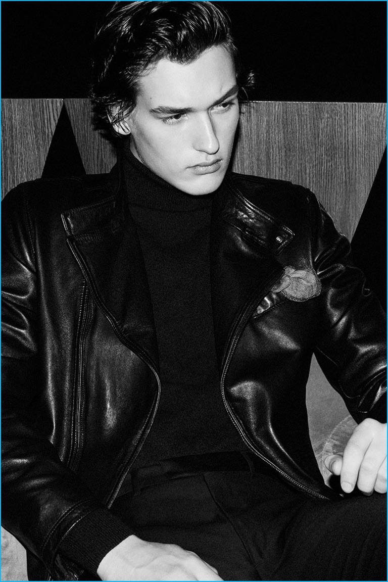 Tapping into a cool edge, Jegor Venned sports a leather jacket, turtleneck, and trousers from Massimo Dutti.