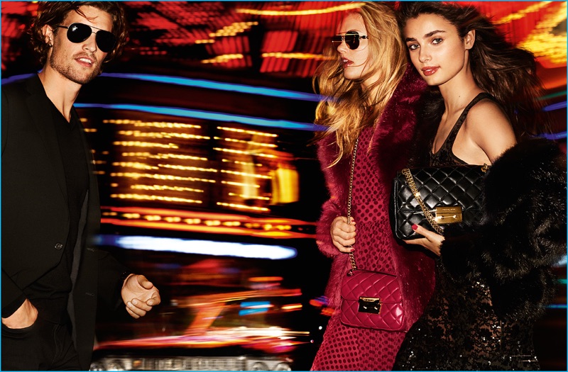 Models Wouter Peelen, Emmy Rappe, and Taylor Hill stars in MICHAEL Michael Kors' holiday 2016 campaign.