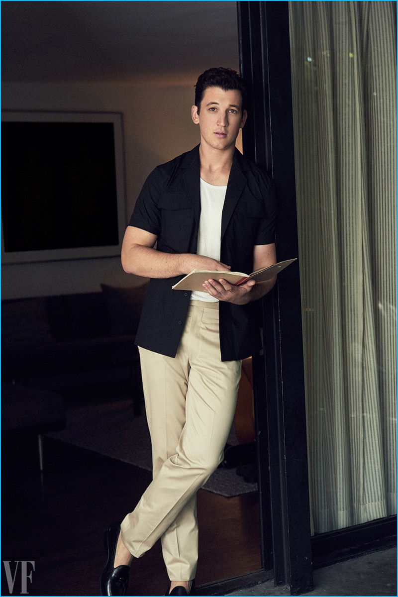 Standing tall at 6' 0", Miles Teller wears a Bottega Veneta shirt with a Calvin Klein tank, Bottega Veneta trousers, and Church's leather loafers. » Miles Teller Links Up with Vanity Fair, Talks Bad Movies Standing tall at 6' 0", Miles Teller wears a Bottega Veneta shirt with a Calvin Klein tank, Bottega Veneta trousers, and Church's leather loafers.