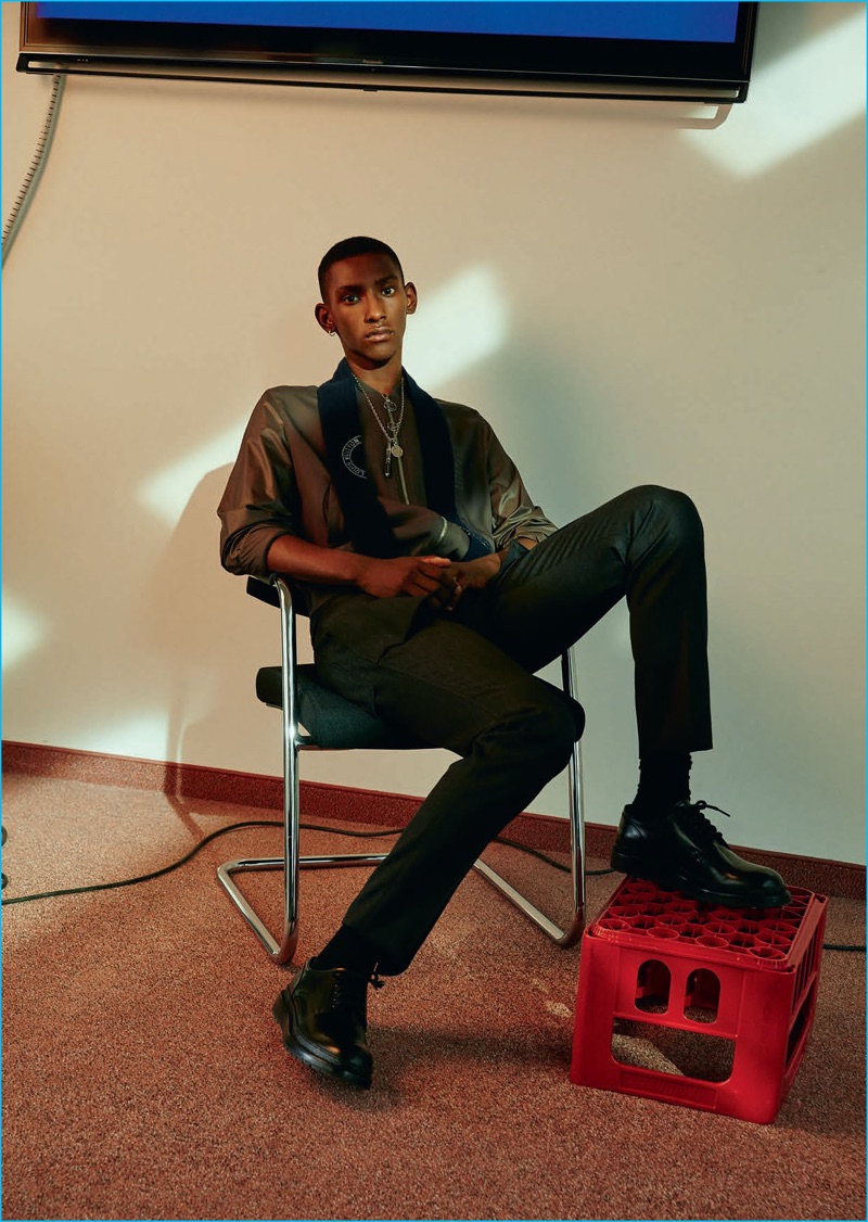 Appearing in an editorial for L'Officiel Hommes Germany, Myles Dominique wears a fall-winter 2016 look from Louis Vuitton.