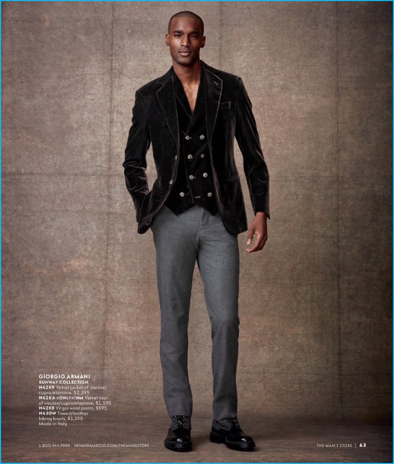 Corey Baptiste sports a velvet waistcoat and blazer with wool pants from Giorgio Armani.