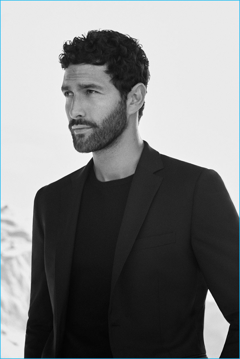 Model Noah Mills is front and center in a sweater and sport coat from Massimo Dutti.
