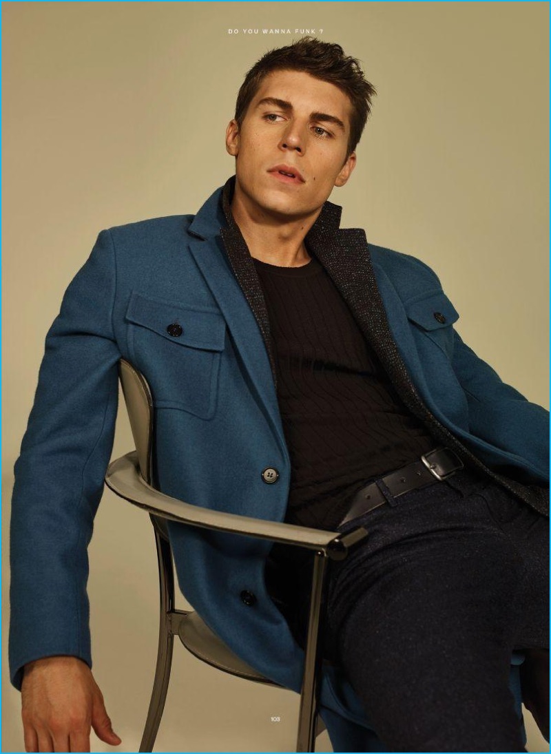 Appearing in a photo shoot for Iris Covet Book, Nolan Gerard Funk dons a Marni coat with a blazer and trousers from Canali. The Canadian actor also wears a Jil Sander shirt and Maxium Henry belt.