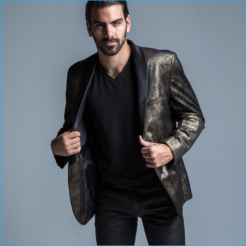 Nyle DiMarco dons a distressed foil blazer for INC International Concepts' holiday 2016 campaign.