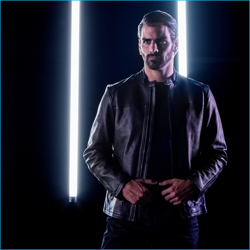 Model Nyle DiMarco is a cool vision in black for INC International Concepts' holiday 2016 campaign.