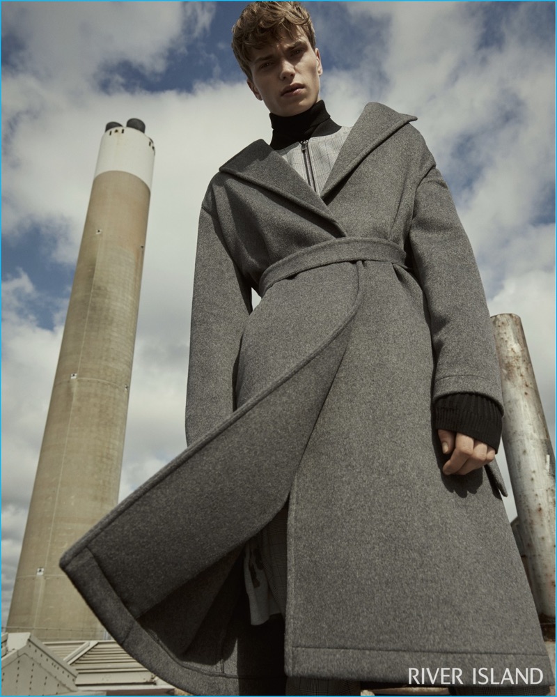 James White photographs Jake Love in a check bomber jacket and grey wool wrap coat from River Island.