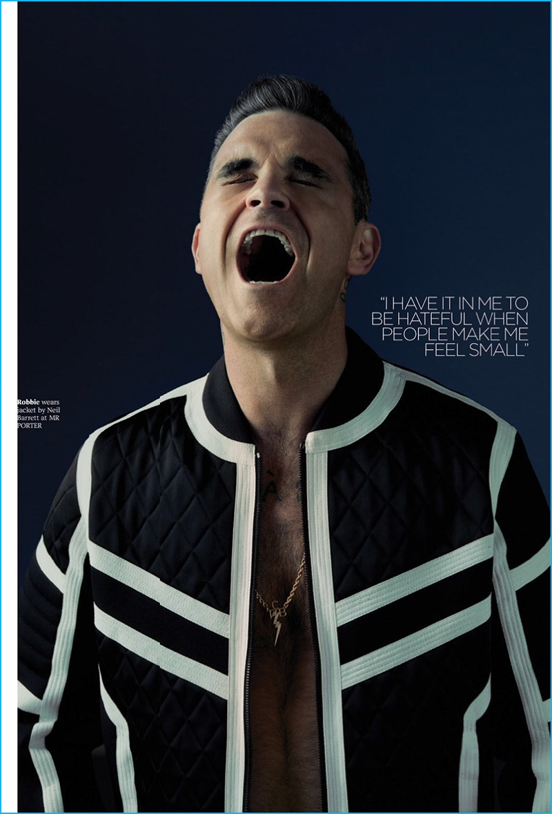 Joseph Kocharian outfits Robbie Williams in a black and white bomber jacket from English designer, Neil Barrett.