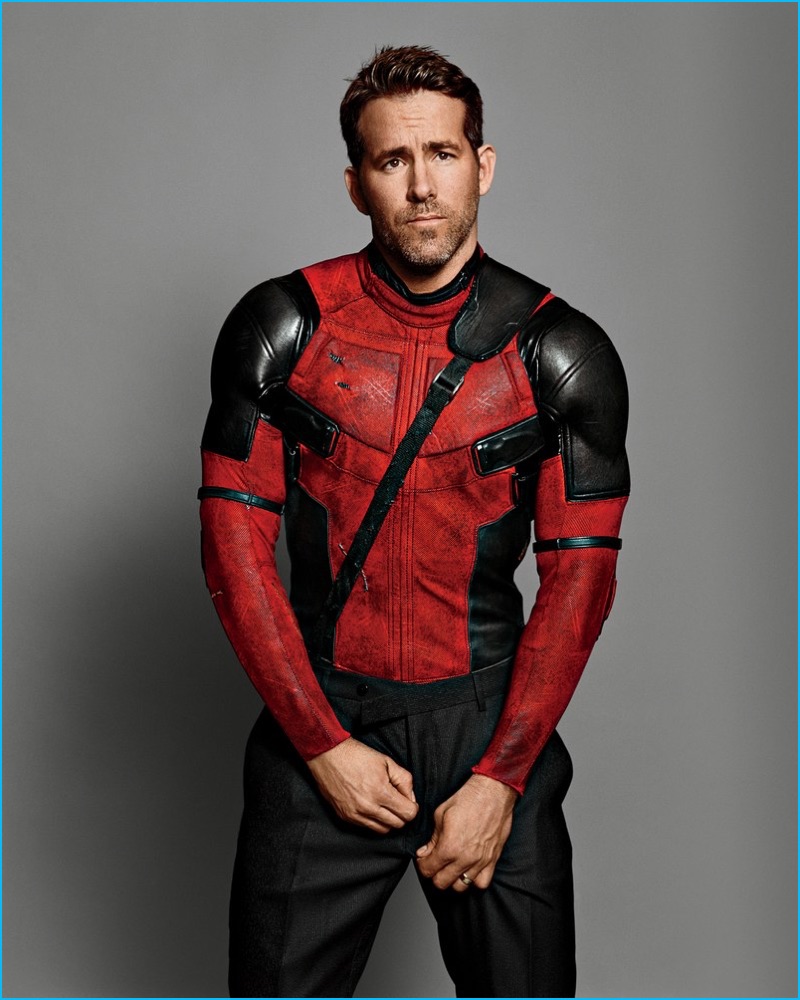 Appearing in a GQ photo shoot, Ryan Reynolds poses for a cheeky image in his Deadpool costume.