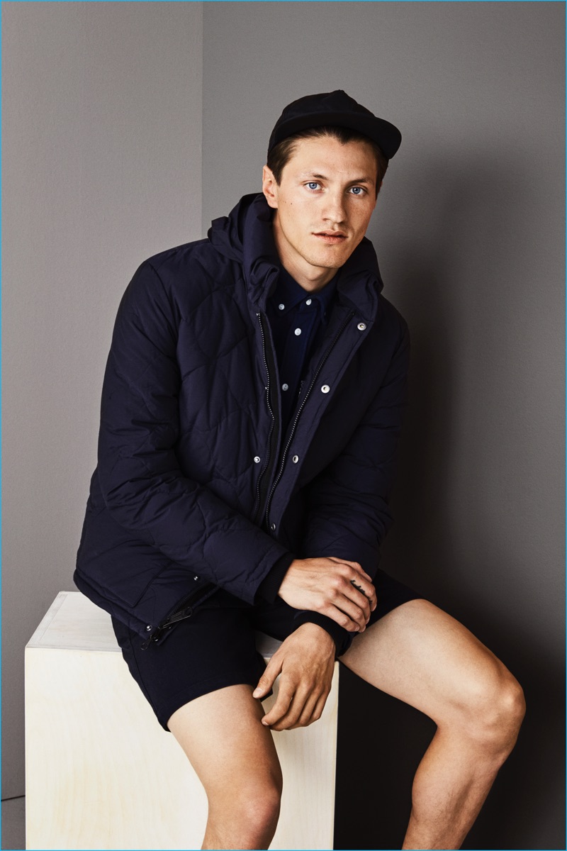 Eli Hall sports a quilted jacket in midnight blue from Saturdays NYC.