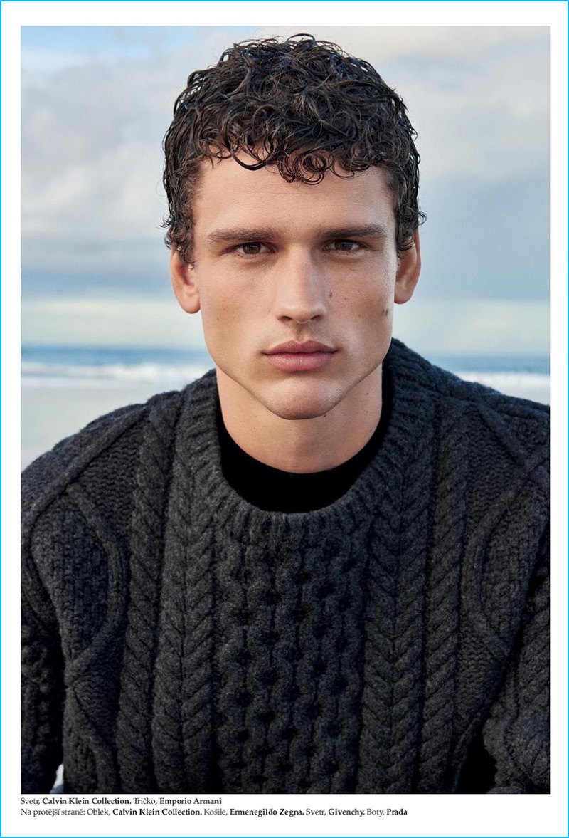 Model Simon Nessman wears a Calvin Klein Collection sweater with an Emporio Armani t-shirt.