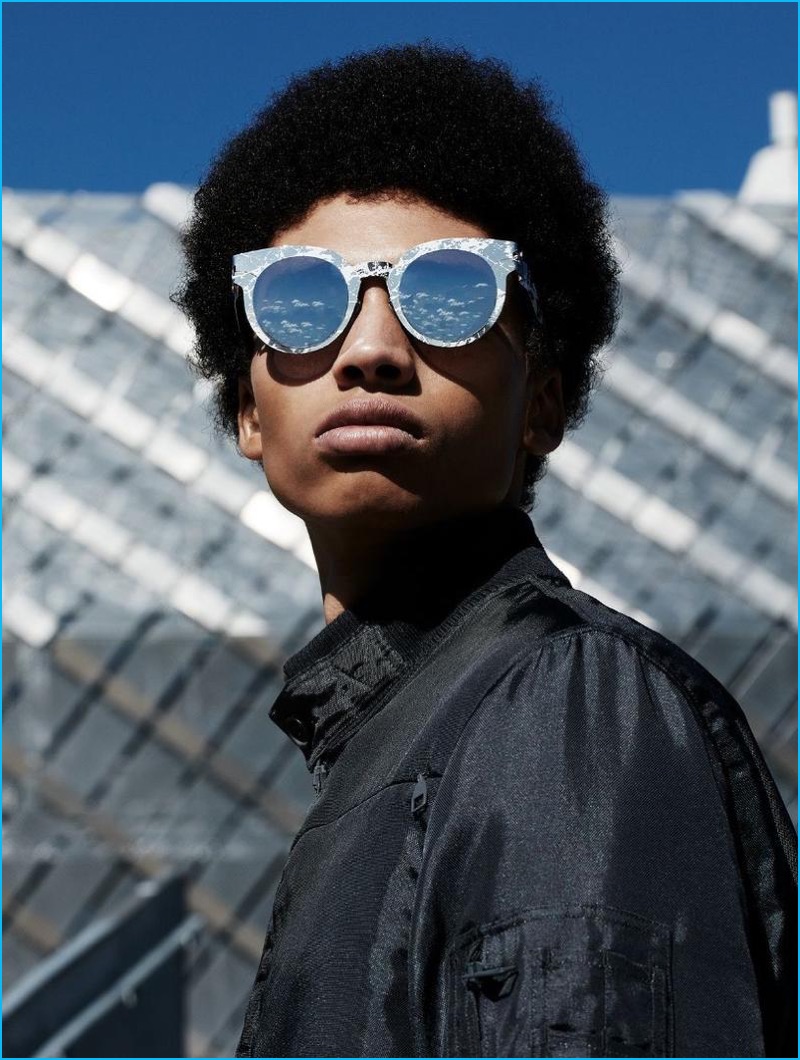 Embracing a futuristic cool, Sol Goss rocks sunglasses from Mykita x Maison Margiela.
